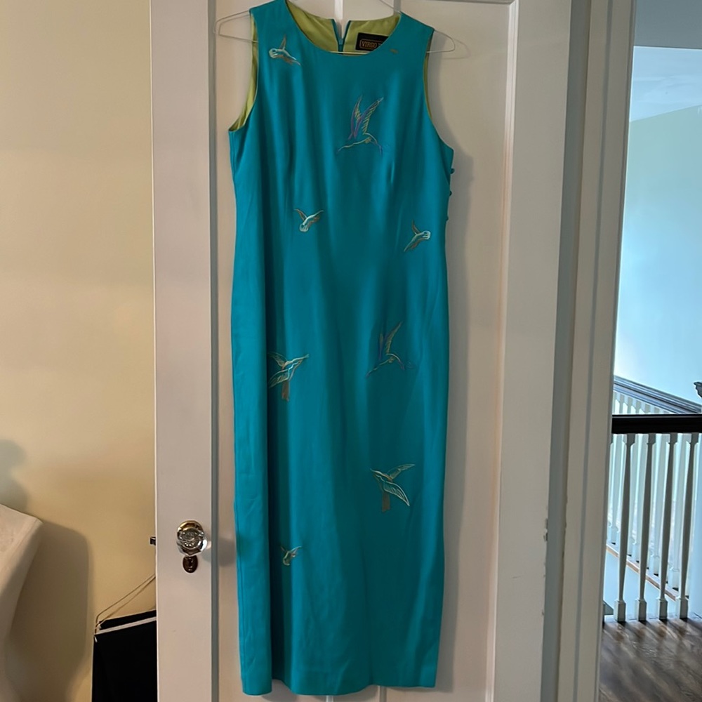 Beautiful aqua blue long dress stitched with multi colored birds